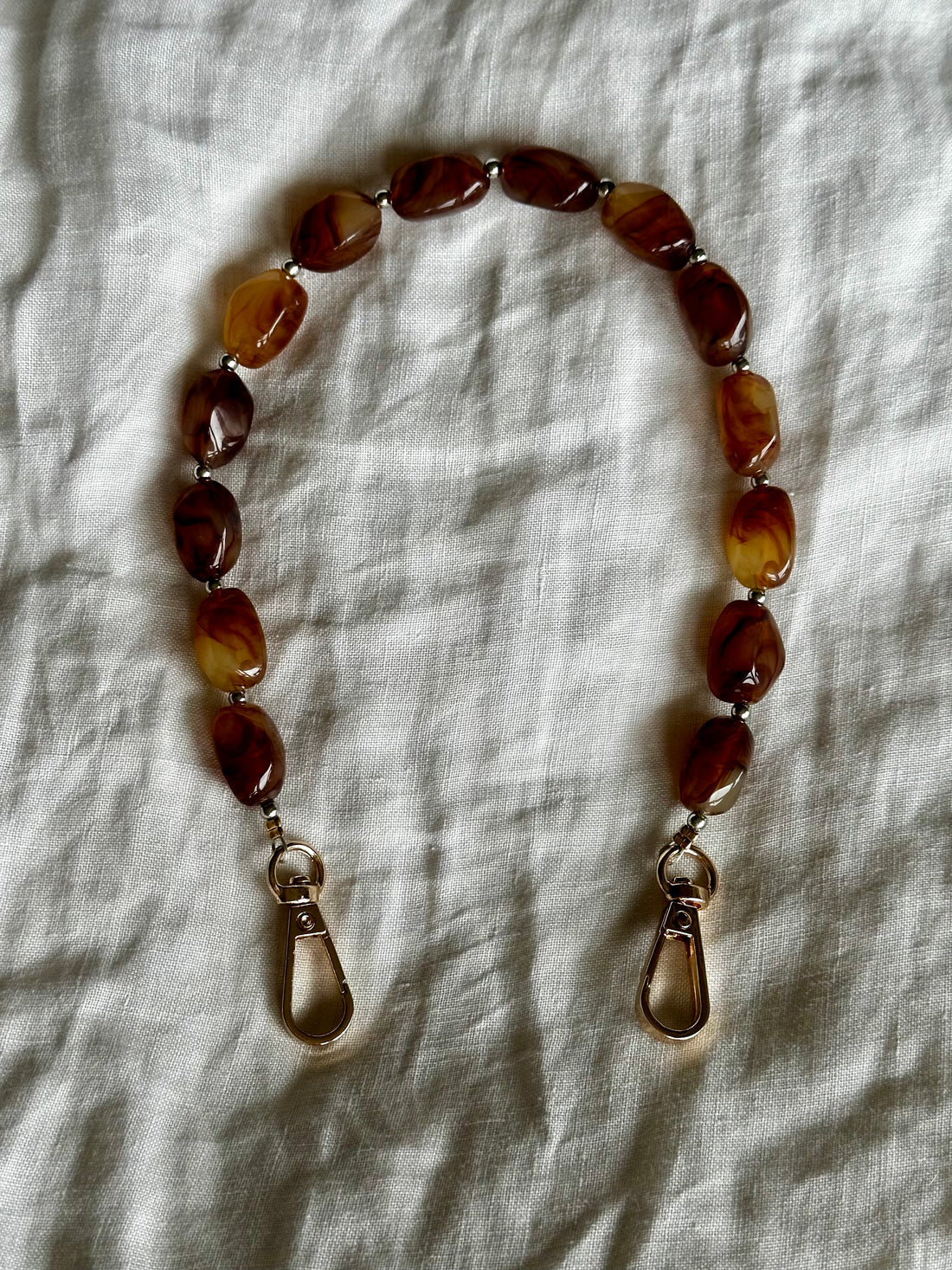 Tynn perler på en snor - Sjokolade