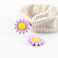 Maskestopper blomst lilla